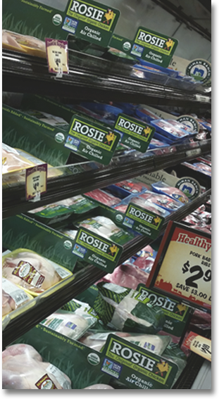 In store display of Rosie The Original Organic Chicken packaging and POS 